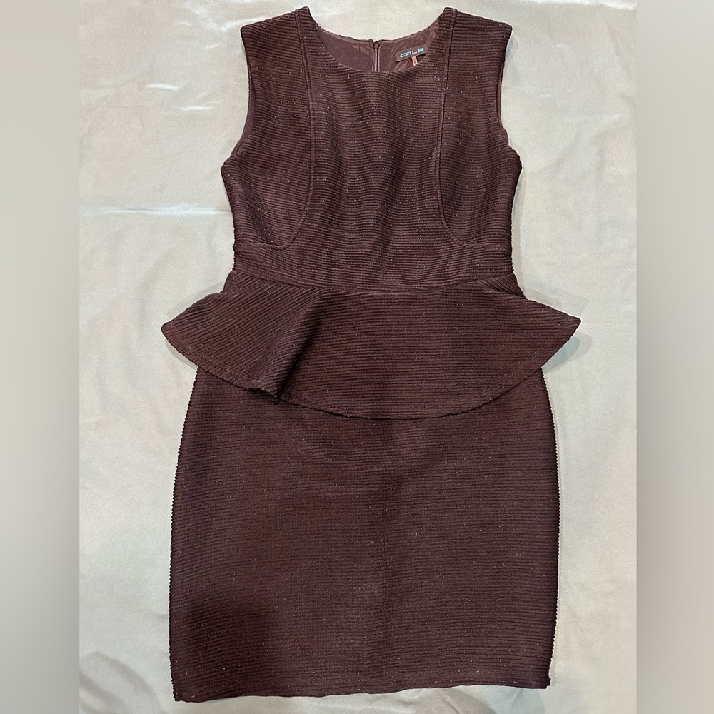 Cals Peplum dress size M, Black Sparkly, Form fitted.